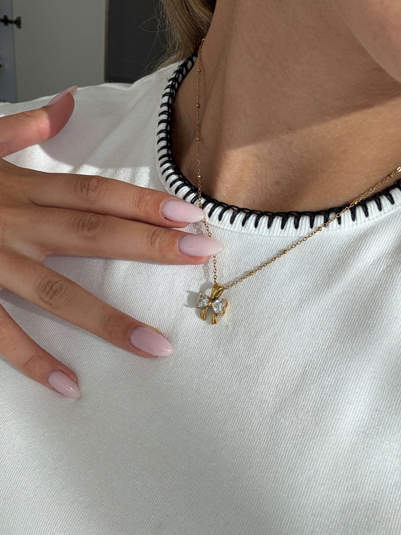 Amira Zirconia Bow Pendant Necklace