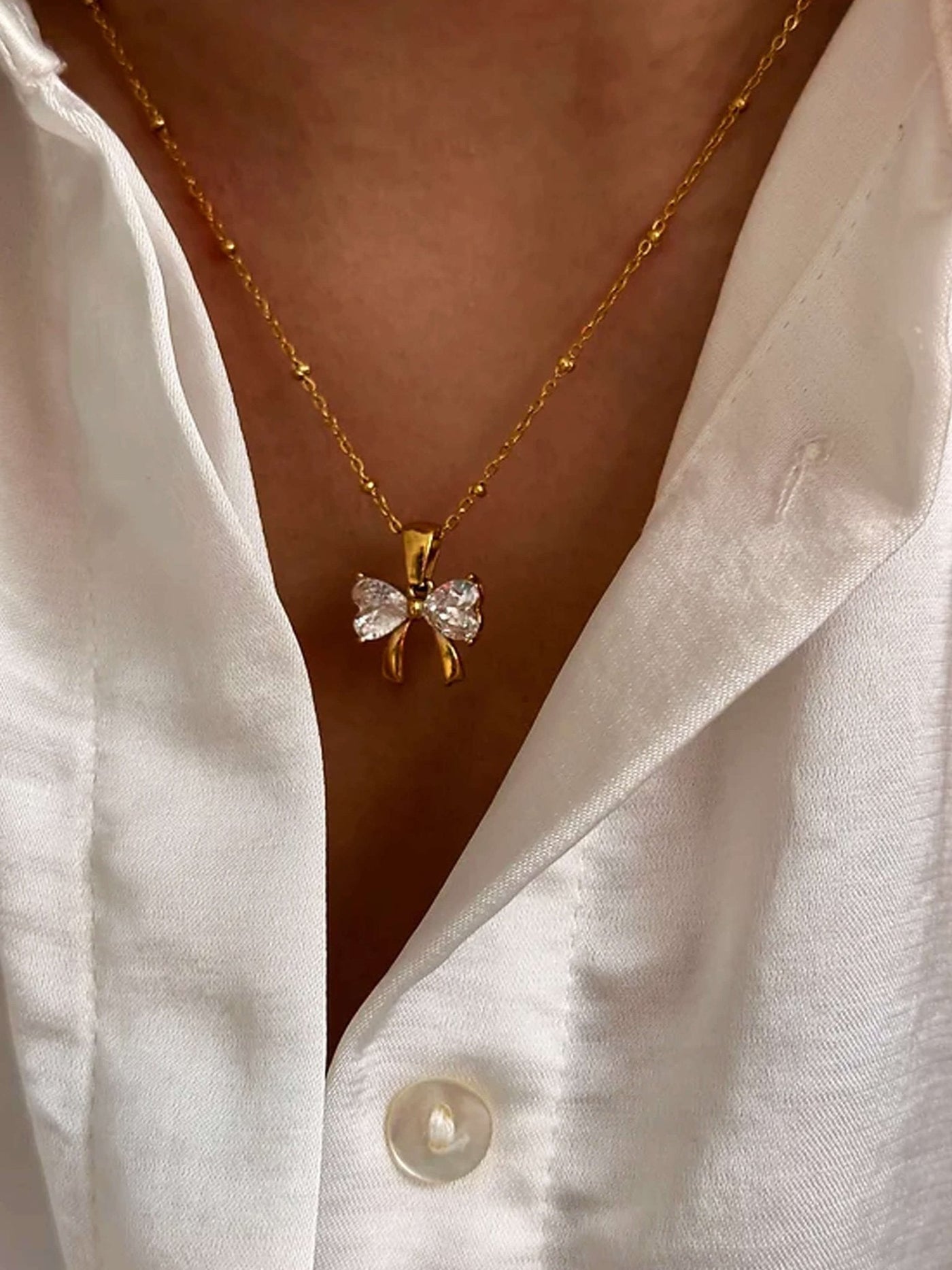 Amira Zirconia Bow Pendant Necklace